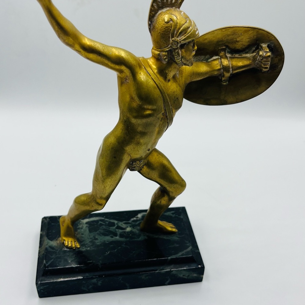 Gold Warrior Sculpture on Black Base